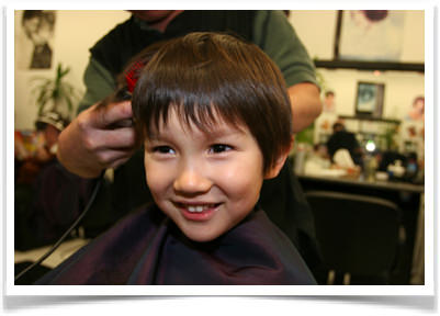 Child having haircut