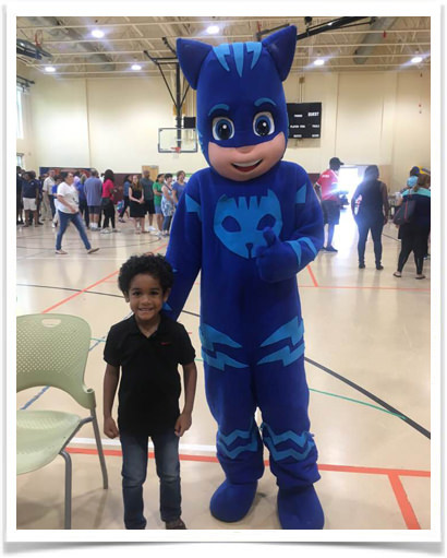 little boy with PJ Masks mascot